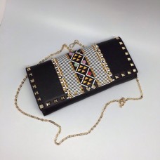 Женская кожаная сумка Valentino Garavani Rockstud черная на цепочке Женская кожаная сумка Valentino Garavani Rockstud черная на цепочке