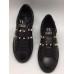 Женские кожаные кроссовки Valentino Garavani Rockstud черные с шипами
